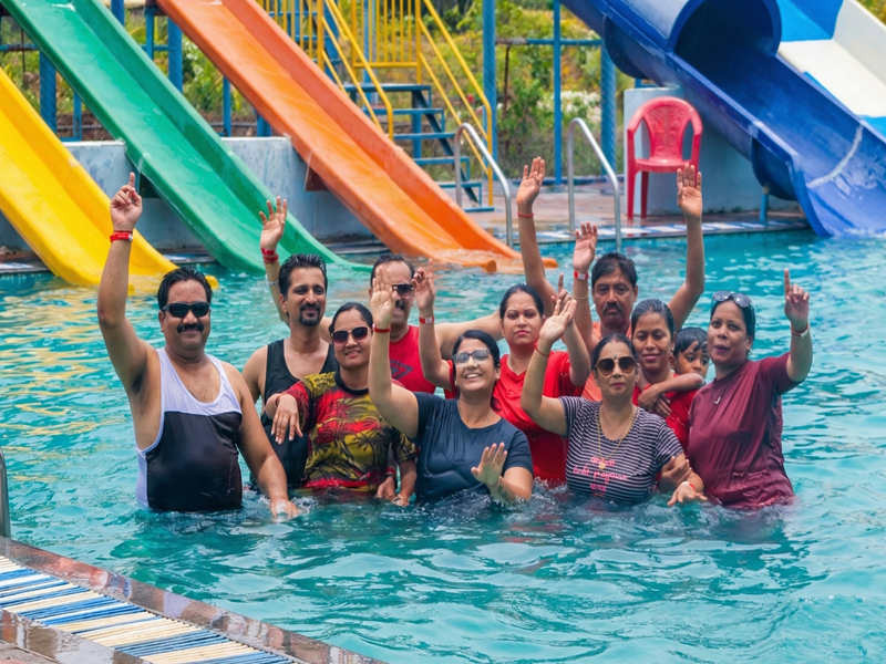 Family enjoying activities at the Best Agro Resort in Shirdi