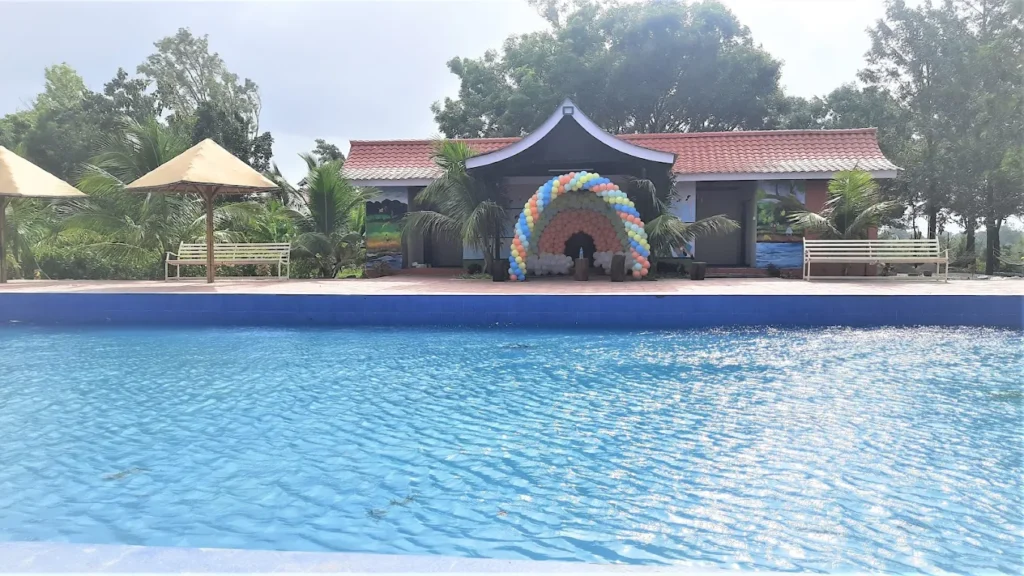 Visitors enjoying farming and village activities at an agro tourism resort near Pune