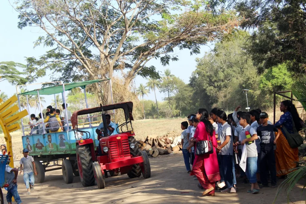 Families enjoying countryside activities at the Best Agro Resort in Shirdi