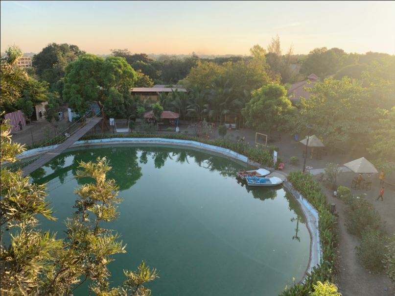 Scenic resort with lake and greenery